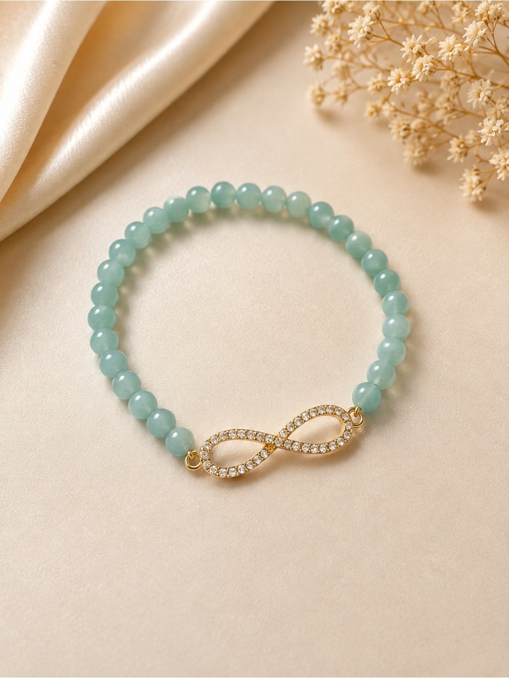 Aqua Beaded Infinity Bracelet with Gold Crystal Charm